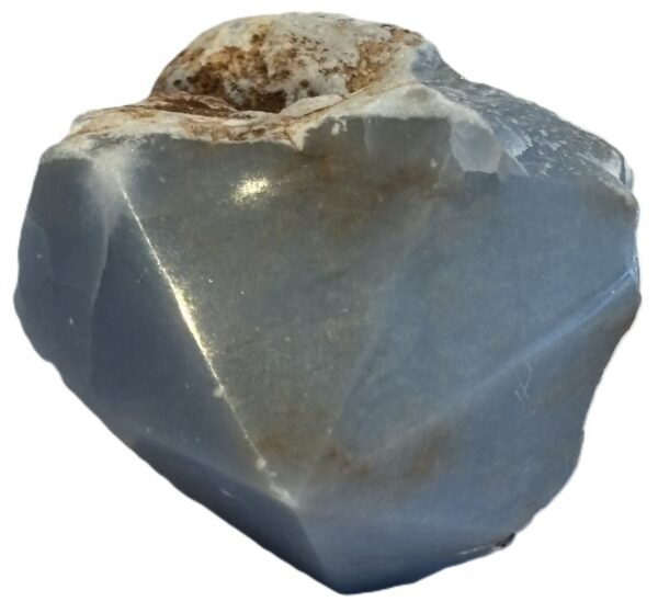 Natural rough angelite freeform with polished point 1 sians emporium Natural rough angelite freeform crystal with unpolished sides and a smooth polished blue point standing on a white background
